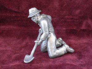 Miner with Shovel